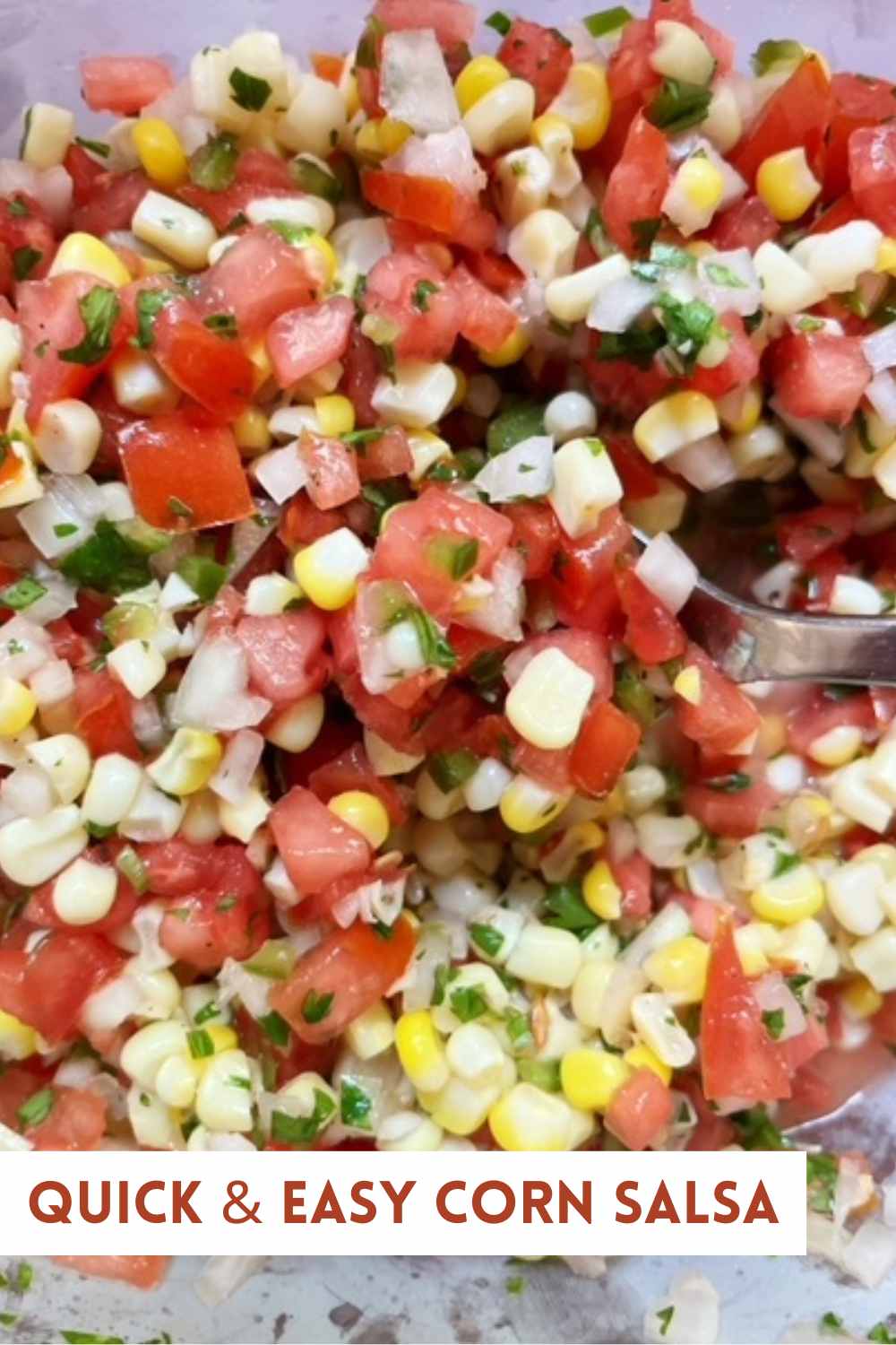This quick and easy corn salsa recipe is great for serving with grilled chicken, for using as a taco topping, or for using as a tortilla chip dip!