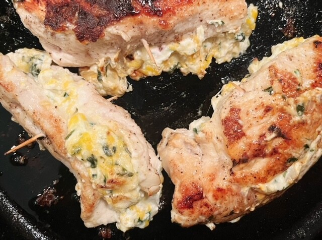 Want a unique entree that will be popular with the whole family? Try this savory spinach and cheese stuffed chicken breast recipe!