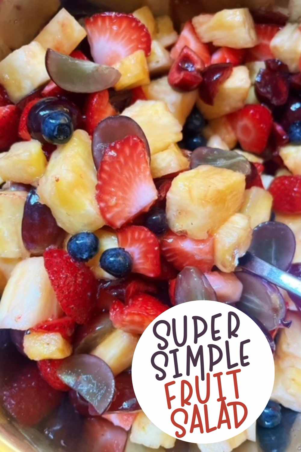 This super simple fruit salad recipe is delicious and refreshing! Mix together your favorite fruits with a touch of maple syrup and you're done.