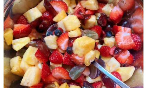 This super simple fruit salad recipe is delicious and refreshing! Mix together your favorite fruits with a touch of maple syrup and you're done.