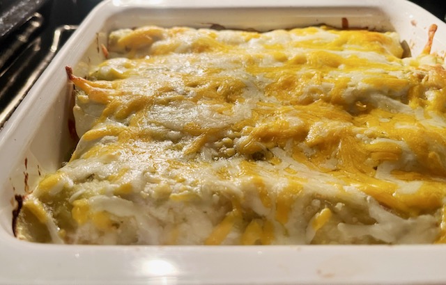 Looking for a delicious and easy meal the family will love? Try these creamy chicken enchiladas! They're packed with shredded chicken, black beans, and the secret ingredient: cream cheese.